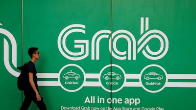 A Grab office in Singapore. Toyota has upped its stake in the ride hailer. Edgar Su/Reuters