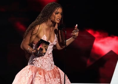 Andra Day accepts Best Actress at the BET Awards. AP