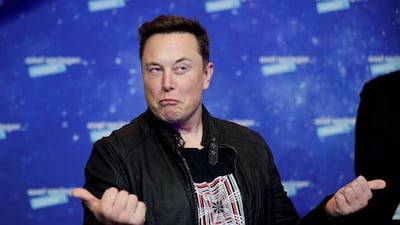 Tesla's billionaire CEO Elon Musk after arriving on the red carpet for the Axel Springer award, in Berlin this month. Mr Musk said he was rebuffed by Apple's CEO when he tried to hold talks with him about Apple possibly buying the company when it faced production problems related to its Model 3 sedan. Reuters