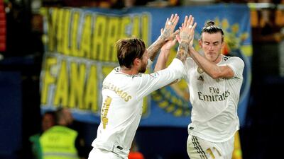 Real Madrid´s Gareth Bale (R) celebrates with Sergio Ramos (L) after scoring against Villarreal during a Spanish LaLiga soccer match between Villarreal and Real Madrid at the Ceramica stadium in Villarreal, eastern Spain. EPA