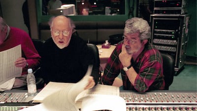 Composer John Williams working with George Lucas on the music for 'Star Wars: Attack of the Clones (Episode II)' at the mixing desk in Studio One. Alamy