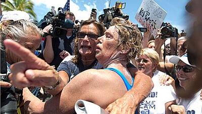 American Diana Nyad, 64, embraces her trainer, Bonnie Stoll, after completing her swm from Havana to Florida. J Pat Carter / AP Photo