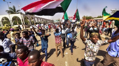 Sudanese demonstrators gather outside the army headquarters in Khartoum. AFP