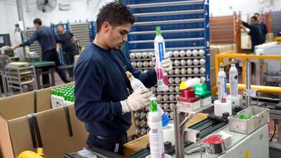 A Palestinian laborer working at the Israeli SodaStream factory in the Mishor Adumim industrial park, next to the West Bank settlement of Ma’ale Adumim. Israel’s SodaStream is to close the controversial West Bank plant, the company said on October 29, 2014. SodaStream, which manufactures a device for making carbonated drinks at home, has 25 factories around the world and employs 800 Palestinians and 500 Israelis at the plant, according to a company spokesman. Menahem Kahana / AFP