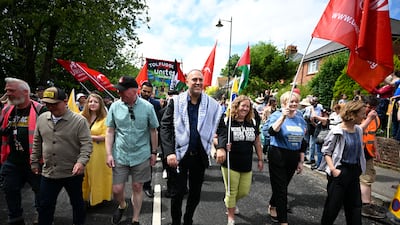 Dr Husam Zomlot, Palestinian ambassador to the UK, takes part in a march through the village, at the Tolpuddle Martyrs Festival. Getty Images