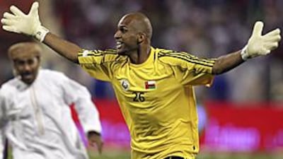 The Oman goalkeeper Ali Al Habsi celebrates after the hosts beat Saudi Arabia to win the the Gulf Cup.