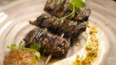 Grilled quail wrapped in vine leaf, pistachio labnah and honey, to be served at Folly by Nick & Scott on February 2