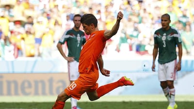 Klaas-Jan Huntelaar of the Netherlands scores the penalty for the 2-1 winner against Mexico on Sunday at the 2014 World Cup round of 16. Dominic Ebenbichler / Reuters