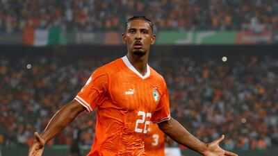 Ivory Coast's Sebastien Haller celebrates after scoring against DR Congo. Reuters