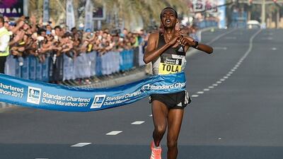 The Ethiopian runner Tamirat Tola crosses the finish line to win the men’s marathon in Dubai in January. When facing a strong headwind, we are keenly aware of the handicap. But with the wind at our backs, we quickly become completely unmindful of the tailwind’s assistance. AFP