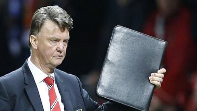 Manchester United's manager Louis van Gaal leaves at the end of the English Premier League soccer match between Manchester United and Chelsea at Old Trafford Stadium, Manchester, England, Monday, Dec. 28, 2015. (AP Photo/Jon Super)