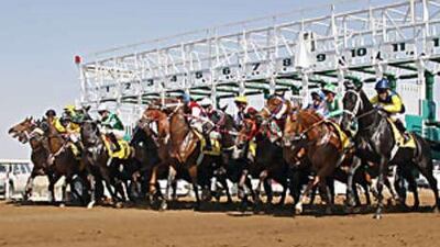 Horses set off on a race at Nad Al Sheba last year; the new season gets underway at this track tomorrow.