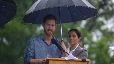 Prince Harry, Duke of Sussex and Meghan, Duchess of Sussex address the public during a Community Event at Victoria Park on October 17, 2018 in Dubbo, Australia. Getty Images