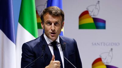 French President Emmanuel Macron delivers his speech to the international peace summit in Rome on Sunday. AFP