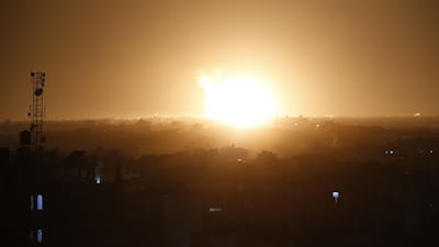 A ball of fire is seen following an Israel airstrike at Rafah in the southern Gaza Strip. AFP