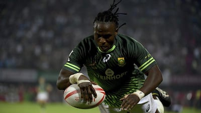 South Africa's Seabelo Senatla scores the try against Fiji in the final of the Dubai Rugby Sevens tournament on Saturday. Martin Dokoupil / AP Photo / December 3, 2016