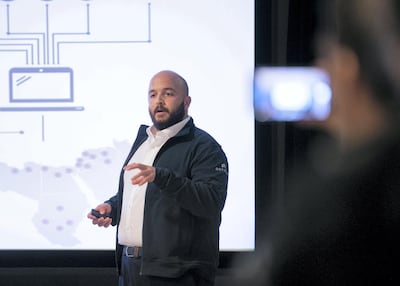 Chief executive Hussein Nasser-Eddin of Red Crow Intelligence, making a pitch at Hub71. Reem Mohammed/The National