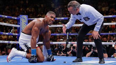 Anthony Joshua after being knocked down during the seventh round of his heavyweight title fight defeat to Andy Ruiz in in New York, in June, 2019. Getty