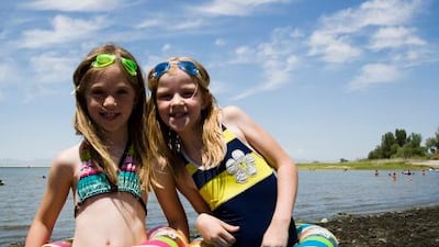 Although there are pitfalls, a family holiday with good friends can be delightful, especially if it gives the children someone to share the pleasures of the beach with.