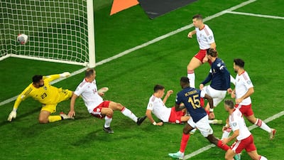 France's Adrien Rabiot, centre, adds his name to the scoresheet. AFP