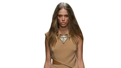 A model for Elisabetta Franchi wears the latest spring/summer collection camel shades. Ernesto Ruscio / Getty Images