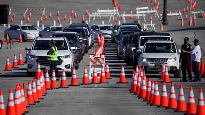 A mass-vaccination of healthcare workers takes place at Dodger Stadium, in Los Angeles. AP Photo