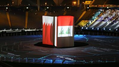 A general view shows the Iraqi (R) and Qatari flag hanging during the opening ceremony of the 22nd Gulf Cup football tournament prior to Saudi Arabia’s match against Qatar in Riyadh on November 13, 2014. Eight nations are taking part in the games including Oman, UAE, Kuwait, Yemen, Bahrain, Iraq, Saudi Arabia and Qatar. AFP PHOTO/KARIM SAHIB