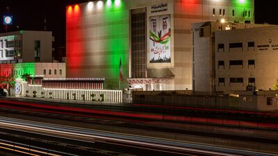 The Kuwait News Agency is illuminated.
