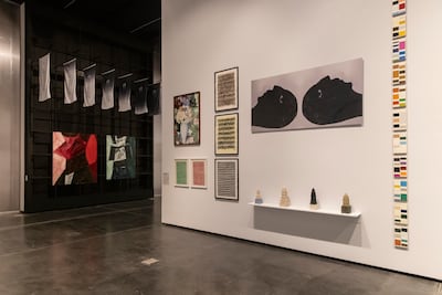 Sadik Kwaish Alfraji’s Waiting for Godot series, shown as dark silhouetted figures in suspended expectation, is among the works at Deja Vu in Concrete, Alserkal Avenue. Antonie Robertson / The National