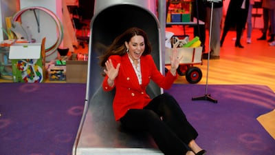 Catherine enjoys a slide during a visit to the Lego Foundation PlayLab in Copenhagen, Denmark, in February 2022