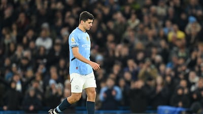 Abdukodir Khusanov of Manchester City looks dejected after he is substituted. Getty Images