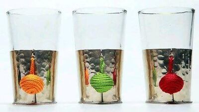 A glass-and-steel tea cups from Bloomingdale's.