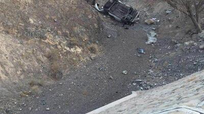 Two people from unspecified Asian countries died after their vehicle swerved and crashed into a wadi. Courtesy RAK Police