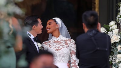 Juan David Borrero and Jasmine Tookes leave their wedding ceremony at the church of San Francisco in Quito, Ecuador, on September 4, 2021. EPA