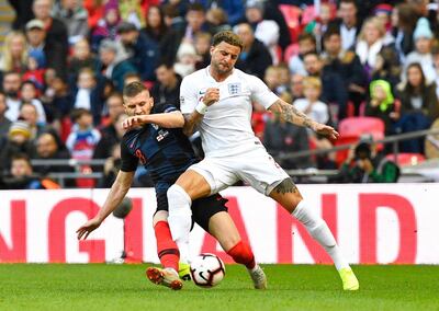 Kieran Trippier faces competition from the likes of Kyle Walker, right, and Trent Alexander-Arnold for England's right-back berth. EPA