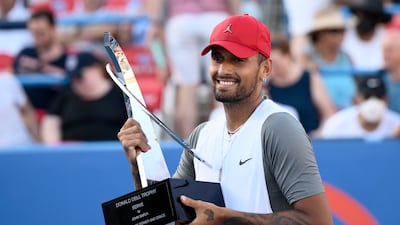 Nick Kyrgios, of Australia, poses with the trophy after he defeated Yoshihito Nishioka, of Japan, during a final at the Citi Open tennis tournament Sunday. AP Photo