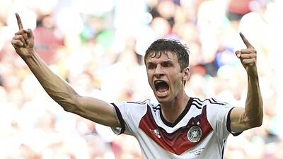 Thomas Muller celebrates scoring his team's third goal on Monday against Portugal at the 2014 World Cup in Salvador, Brazil. Dylan Martinez / Reuters / June 16, 2014