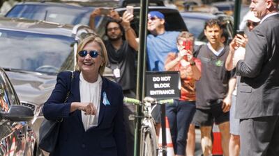 Democratic presidential candidate Hillary Clinton leaves her daughter’s apartment building in New York on September 11, 2016. Craig Ruttle / AP Photo