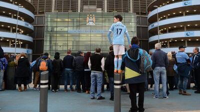 Fans wait for players’ arrival prior to the Premier League match between Manchester City and West Bromwich Albion at the Etihad Stadium on April 9, 2016 in Manchester, England. (Photo by Gareth Copley/Getty Images)