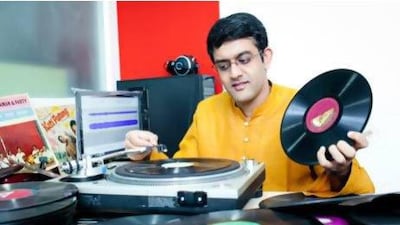 Vikram Sampath digitises old Indian records for his archive in his studio in Bangalore.
