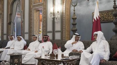 Sheikh Mohammed bin Zayed meets Sheikh Tamim bin Hamad Al Thani at Al Bahr Palace. With them are Sheikh Tahnoun bin Zayed, National Security Adviser, third right, Sheikh Mansour bin Zayed, fourth right, Ali Al Shamsi, fifth right, and Mohammed Al Mazrouei, left. Rashed Al Mansoori / Crown Prince Court - Abu Dhabi