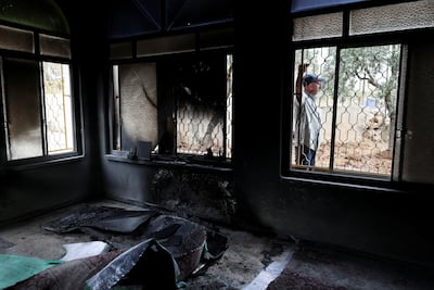 Damage inside a mosque that Palestinians say was was set alight by Israeli settlers in Mukhmas, near Ramallah, in the Israeli-occupied West Bank. Reuters