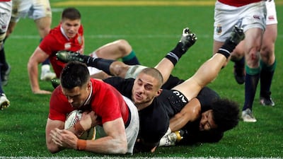 Conor Murray touches down over the try line to score for the British & Irish Lions. Anthony Phelps / Reuters