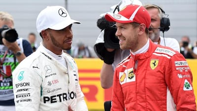 Lewis Hamilton, left, leads Sebastian Vettel by 24 points in the drivers' standings. AFP