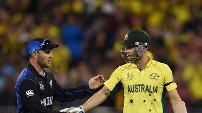 Australia's Michael Clarke shakes hands with New Zealand's captain Brendon McCullum in Melbourne. AFP