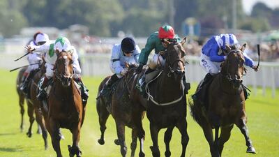 Paul Hanagan riding Muhaarar, right, in The Irish Thoroughbred Marketing Gimcrack Stakes at York racecourse on August 23, 2014, in York, England. Alan Crowhurst / Getty Images