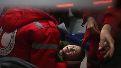 The Syrian American Medical Society said four patients were taken to hospitals in Damascus, the first of 29 critical cases approved for medical evacuation. Amer Almohibany / AFP Photo