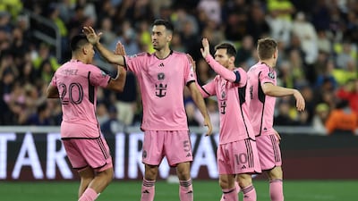 Lionel Messi celebrates with his Inter teammates after scoring. Getty Images