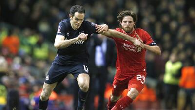 West Ham's Joey O'Brien, left, in action against Liverpool's Joe Allen. Reuters / Phil Noble