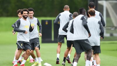 Mohamed Salah training with Liverpool teammates. Getty